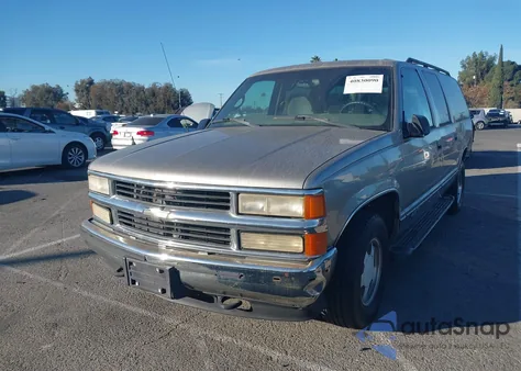 1999 Chevrolet Suburban 1500 Lt из США, поврежденный, VIN 3GNEC16R1XG252104